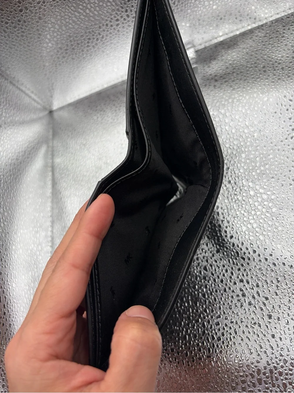 Michael Kors Black Textured Leather Bi-Fold Wallet with Gold Logo